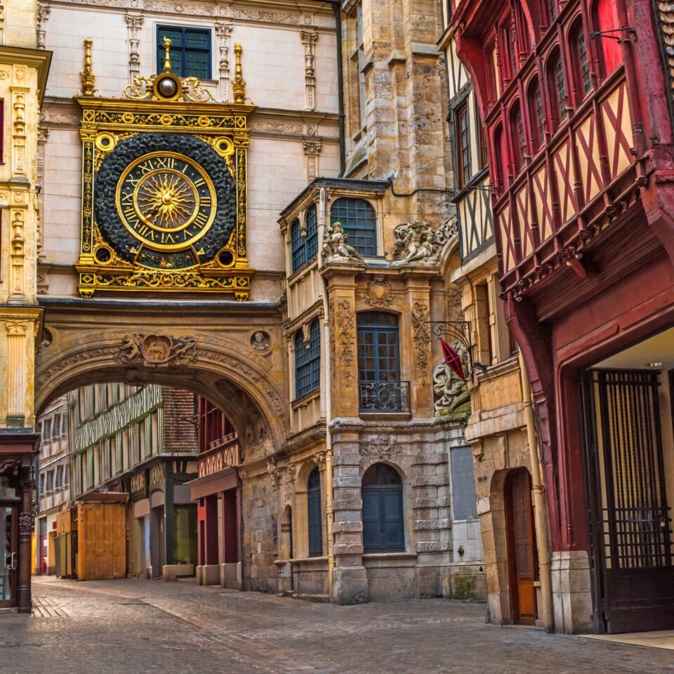 old cozy street in Rouen with famos Great clocks or Gros Horloge of Rouen, Normandy, France with nobody